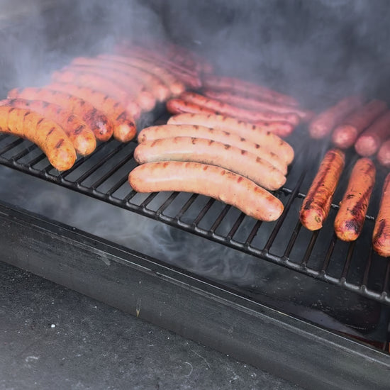 Graze & Roam Ranch grilling pork and beef brats